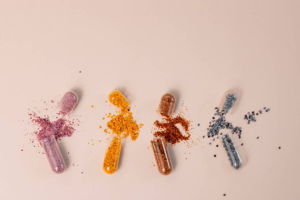 A vet explaining copper importance to pet owners using diagrams.